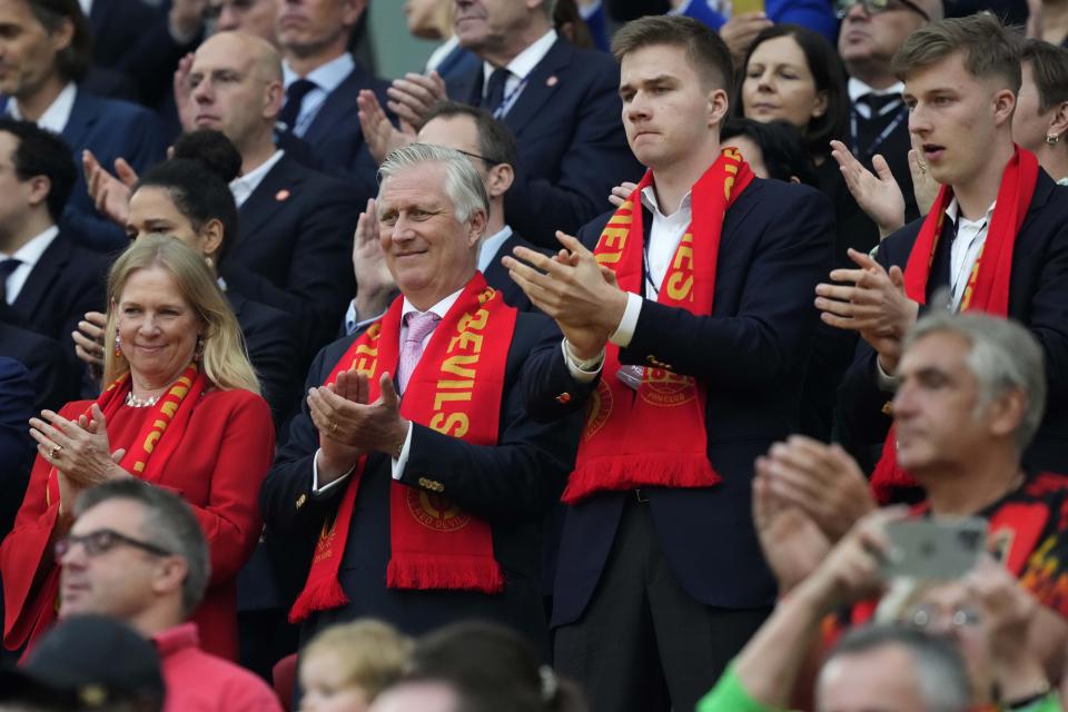 Belgium's King Philippe, Queen Mathilde, Prince Emmanuel and Prince Gabriel arrive for a Group E match between Belgium and Romania at the Euro 2024 soccer tournament in Cologne, Germany, Saturday, June 22, 2024. (AP Photo/Martin Meissner)
