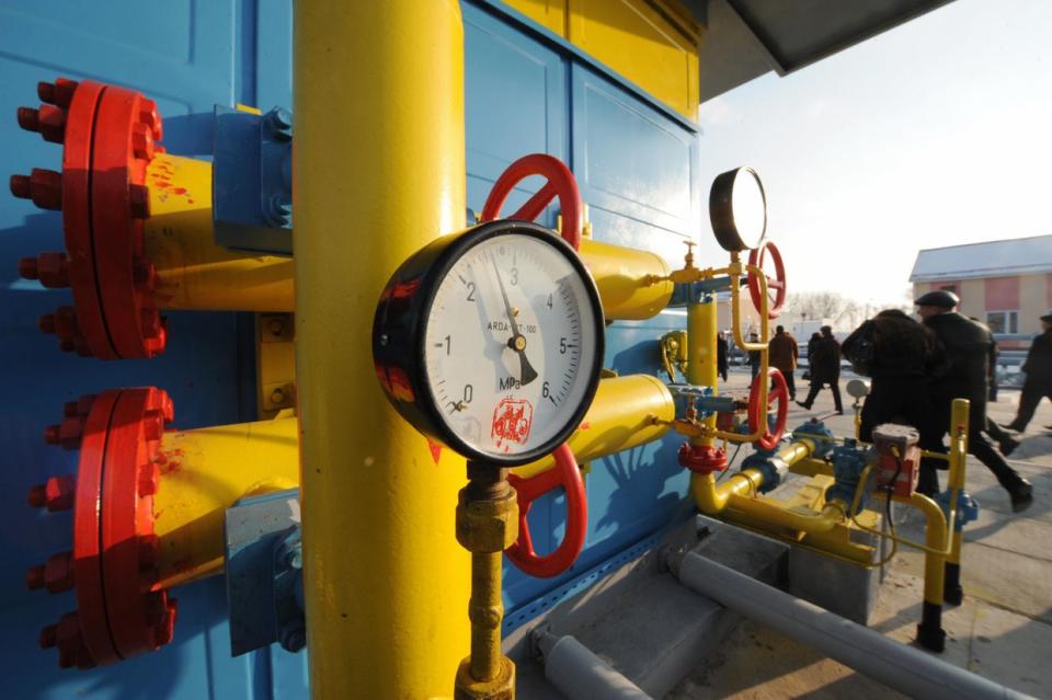 A picture showing Naftogaz workers leaving the Bobrovnytska gas-compressor and gas-holder station in Mryn, Chernihiv Oblast, about 130 kilometers from Kyiv on Dec. 16, 2008. Russia's Gazprom halted its supply of natural gas to Ukraine on Jan. 1, 2009 amid a gas dispute. (Sergei Supinsky/AFP via Getty Images)