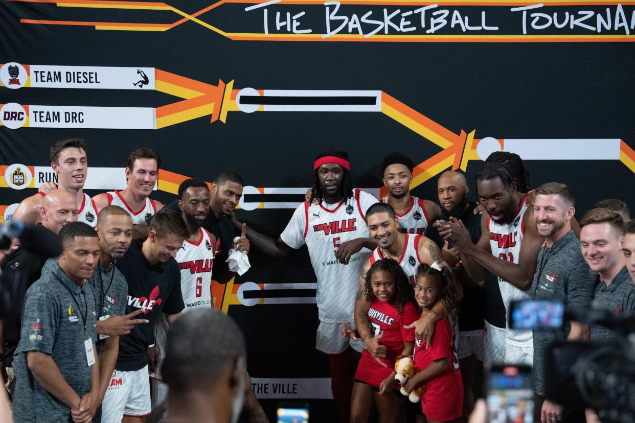 The Ville poses for a photo after beating UKnighted 79-70 during their game on Saturday, July 20, 2024 in Louisville, Ky. at Freedom Hall during the first round of The Basketball Tournament.