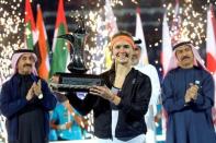 Tennis - Dubai Open - Women's Singles Final - Caroline Wozniacki of Denmark v Elina Svitolina of Ukraine - Dubai, UAE - 25/2/2017 - Elina Svitolina of Ukraine holds her trophy at the end of the match. REUTERS/Stringer