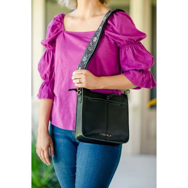 <p><a href="https://go.redirectingat.com?id=74968X1596630&url=https%3A%2F%2Fwww.walmart.com%2Fip%2FThe-Pioneer-Woman-Josie-Medium-Crossbody-Handbag-with-Guitar-Strap-Windsor-Wine-Women-s%2F2262676411&sref=https%3A%2F%2F" rel="nofollow noopener" target="_blank" data-ylk="slk:Shop Now;elm:context_link;itc:0;sec:content-canvas" class="link ">Shop Now</a></p><p>The Pioneer Woman Josie Medium Crossbody Handbag</p><p>$28.00</p>