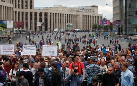 People attend a rally organised by Union of Journalists in support of the investigative journalist Ivan Golunov in Moscow