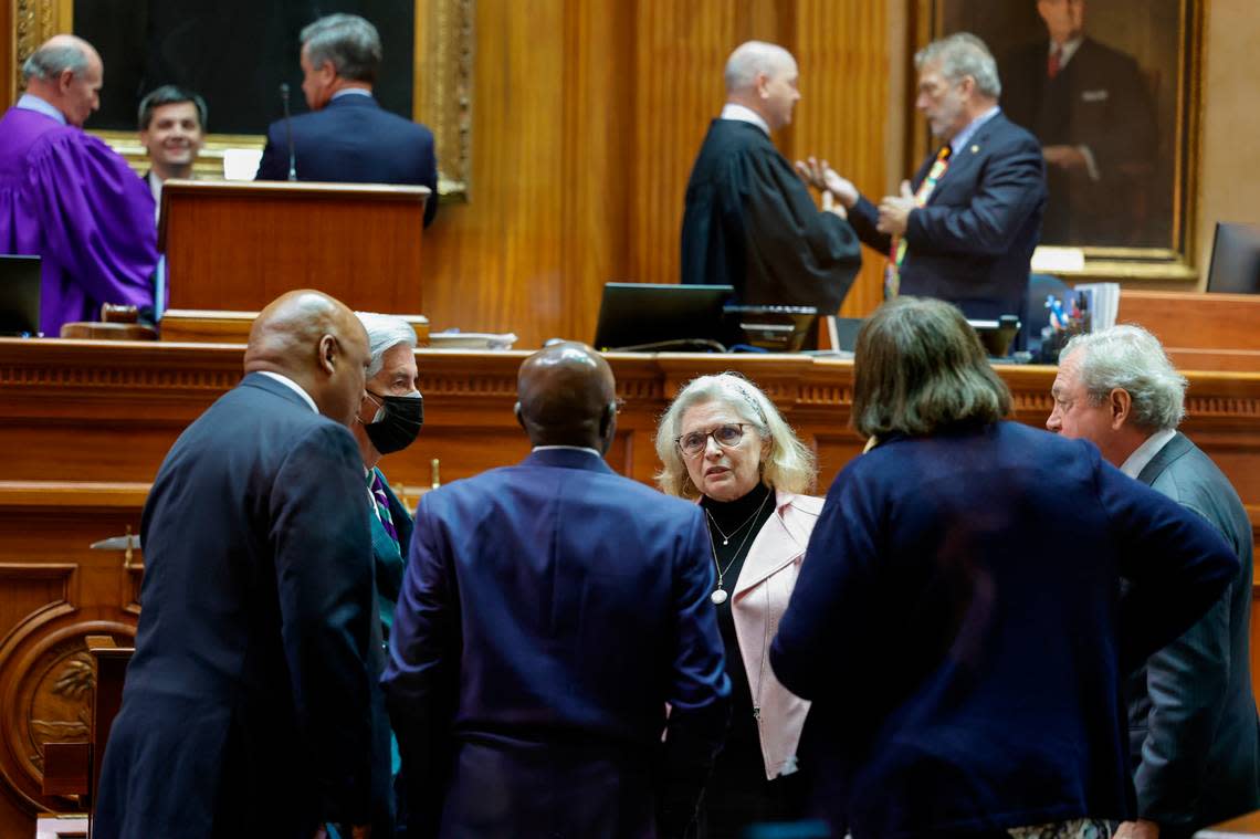 Senators confer during a break while debating amendments about the ban on abortion in the South Carolina Senate chamber on Thursday Sept. 08, 2022.