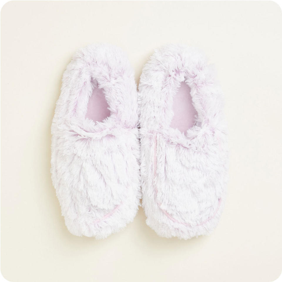 <p><a href="https://go.redirectingat.com?id=74968X1596630&url=https%3A%2F%2Fwarmies.com%2Fproducts%2Fmarshmallow-lavender-warmies-slippers%3Fvariant%3D33667106832472%26g_acctid%3D168-542-6056%26g_adgroupid%3D142967946950%26g_adid%3D611559763670%26g_adtype%3Dpla%26g_campaign%3DM6%2B-%2BSHP%2B-%2BACQ%2B-%2BNB%2B-%2BTop%2BTerms%2B-%2BAll%2BProducts%2B%255BHigh%255D%2B-%2BtROAS%2B-%2BUS%26g_campaignid%3D17557408708%26g_ifproduct%3Dproduct%26g_keywordid%3Dpla-293946777986%26g_merchantid%3D256194347%26g_network%3Dg%26g_partition%3D293946777986%26g_productchannel%3Donline%26g_productid%3D33667106832472%26gclid%3DCjwKCAjw5pShBhB_EiwAvmnNV4dWgt0y9hqmIasWRAVtg5Bz4mG7_CVFvwY40nOzvNvEVJLq523PzhoCu3AQAvD_BwE&sref=https%3A%2F%2Fwww.thepioneerwoman.com%2Fholidays-celebrations%2Fgifts%2Fg35809391%2Fgifts-for-mom-from-son%2F" rel="nofollow noopener" target="_blank" data-ylk="slk:Shop Now;elm:context_link;itc:0;sec:content-canvas" class="link ">Shop Now</a></p><p>Marshmallow Lavender Warmies Slippers</p><p>warmies.com</p><p>$29.99</p><span class="copyright">Warmies</span>