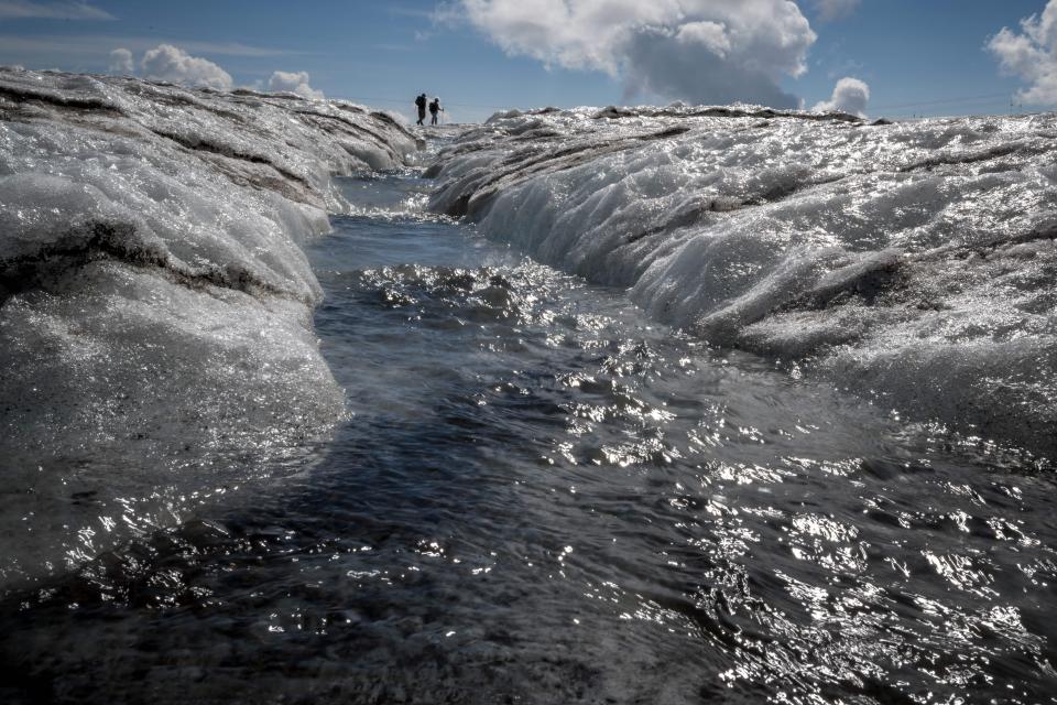 The image, taken on August 6, 2022, shows meltwater stream from the Tsanfleuron Glacier in the Swiss Alps