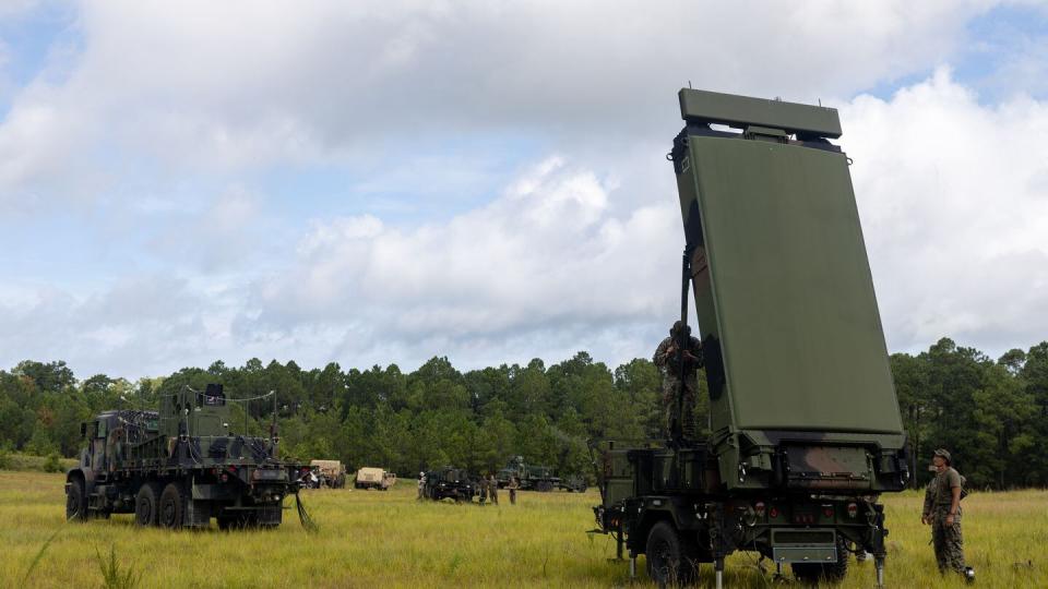 U.S. Marines set up an AN/TPS-80 Ground/Air Task Oriented Radar system as part of a larger tactical air operations center on Marine Corps Base Camp Lejeune, N.C., on Aug. 17, 2023. (Cpl. Adam Henke/U.S. Marine Corps)