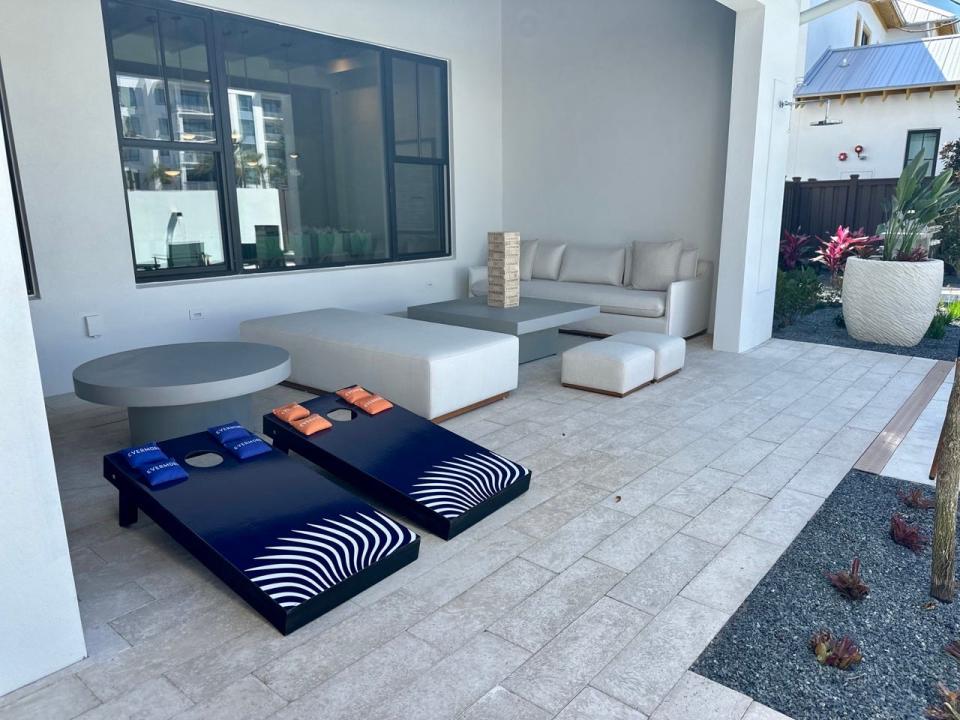 Private outdoor space with cornhole