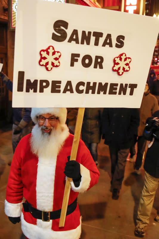 A protester takes part in a rally to support the impeachment and removal of President Trump in Chicago