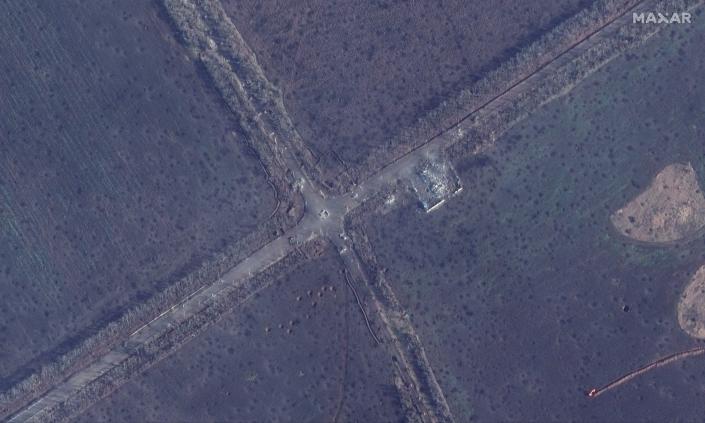 Craters caused by artillery and shelling seen in the fields of highway intersection northeast of Bakhmut city in Ukraine on Wednesday (Satellite image ©2023 Maxar Technologies)