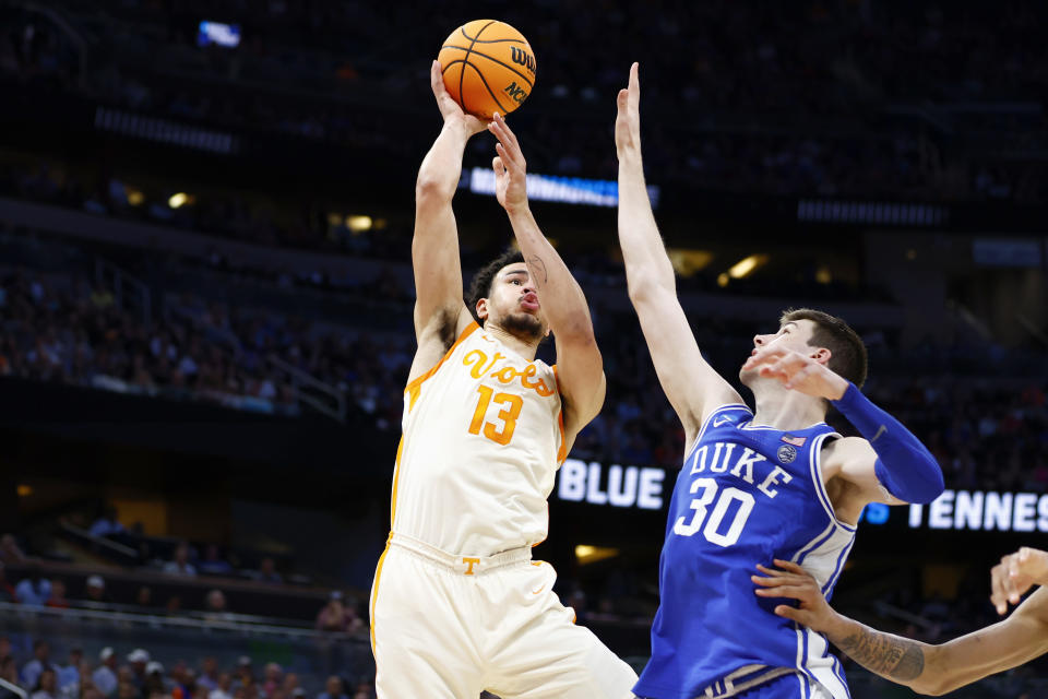 Olivier Nkamhoua of the Tennessee Volunteers shoots the ball over Kyle Filipowski of the Duke Blue Devils on March 18, 2023. (Kevin Sabitus/Getty Images)