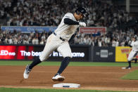 New York Yankees' Juan Soto rounds third base in the fifth inning of a baseball game against the Miami Marlins, Tuesday, April 9, 2024, in New York. (AP Photo/Peter K. Afriyie)