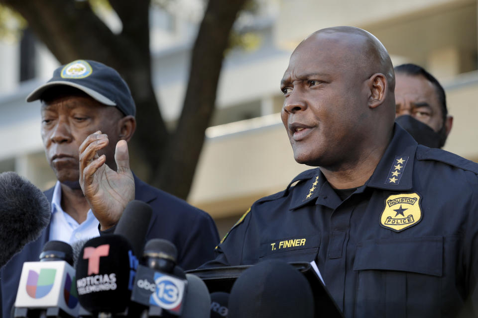 Houston Police Chief Troy Finner, right, speaks next to Mayor Sylvester Turner, left, during a news conference, Saturday, Nov. 6, 2021, in Houston, after several people died and scores were injured during a music festival the night before. (AP Photo/Michael Wyke)