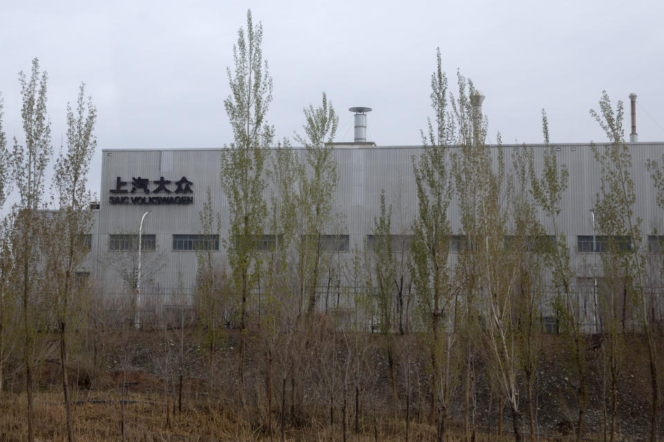 An SAIC Volkswagen plant is seen in the outskirts of Urumqi in northwestern China's Xinjiang Uyghur Autonomous Region, Thursday, April 22, 2021. An audit commissioned by Volkswagen has found no indication of forced labor at its plant in China's Xinjiang region, where Western governments have accused the Chinese government of human rights violations against the Uyghur ethnic minority, announced in a media briefing in Germany on Tuesday Dec. 5, 2023. (AP Photo/Mark Schiefelbein)