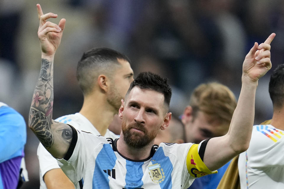 Lionel Messi celebrates Argentina after defeated Croatia 3-0 in a World Cup semifinal soccer match at the Lusail Stadium in Lusail, Qatar, Tuesday, Dec. 13, 2022. (AP Photo/Natacha Pisarenko)