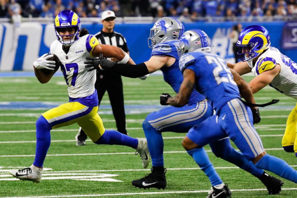 Rams wide receiver Puka Nacua (17) runs after a catch against the Detroit Lions.