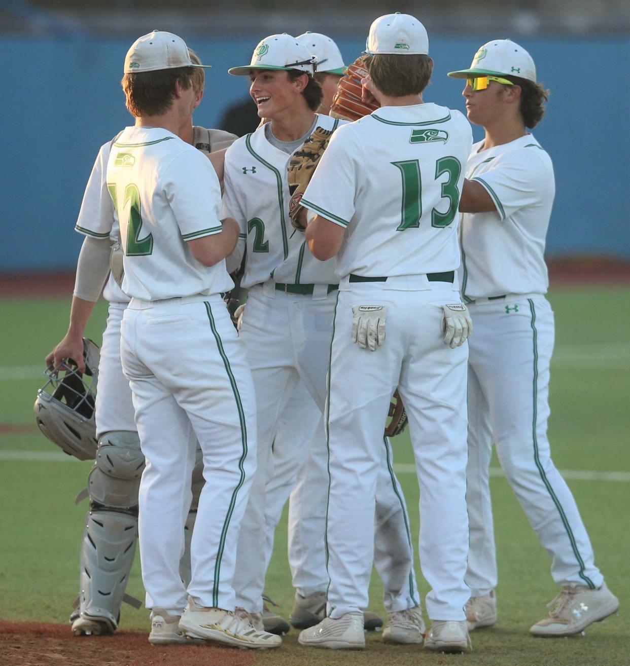 The Wall High School baseball team keeps things light during the District 6-3A championship against Jim Ned at Angelo State's Foster Field at 1st Community Credit Union Stadium on Monday, May 2, 2022.