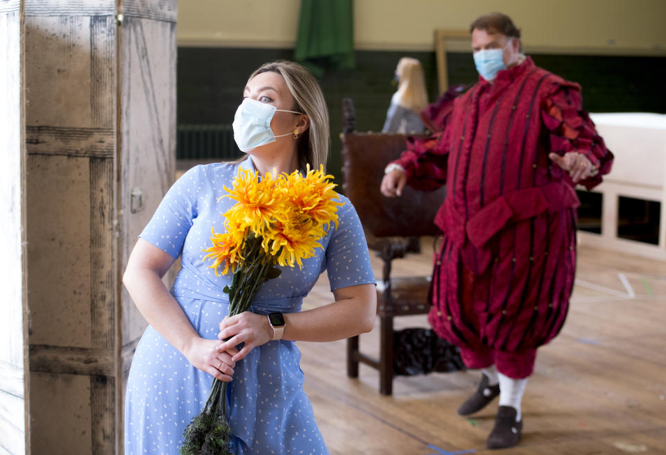 <p>Natalya Romaniw and Bryn Terfel are masked and socially distanced during a rehearsal of Falstaff for the Grange Park Opera. The rehearsals have been taking part at Alford House, in London, before the opera is seen from the 10th June-18 July. Picture date: Monday May 10, 2021.</p>
