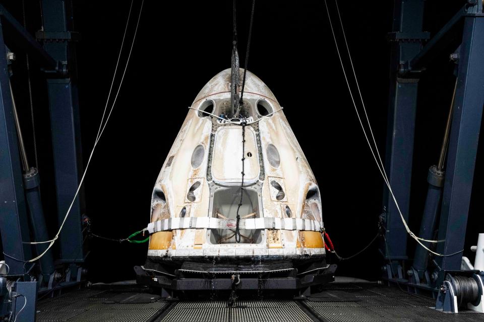 The SpaceX Crew Dragon Freedom capsule is hoisted onto the SpaceX recovery vessel "Megan" after a successful splashdown in the Gulf of Mexico at 11:04 p.m. EDT on May 30 wrapping up the 10-day Axiom-2 private astronaut mission to the International Space Station.