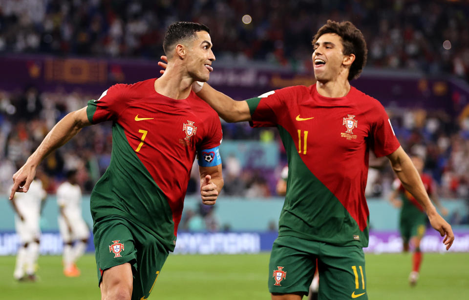 Cristiano Ronaldo (pictured left) celebrates his goal.