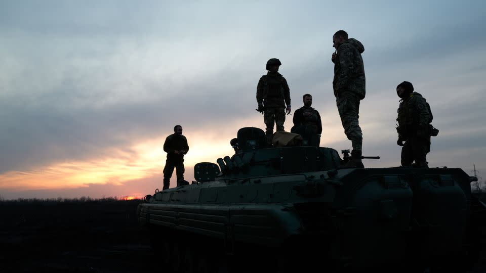 Soldiers on are seen on an armored vehicle outside Avdiivka on February 14. - Vlada Liberova/Libkos/Getty Images