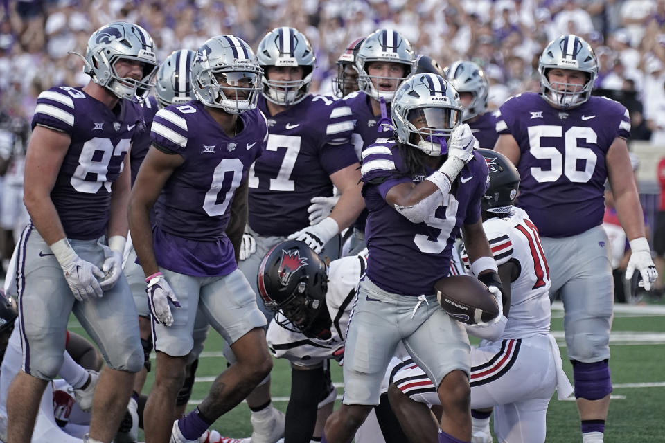 Kansas State running back Treshaun Ward (9) celebrates after scoring a touchdown during the first half of an NCAA college football game against Southeast Missouri State Saturday, Sept. 2, 2023, in Manhattan, Kan. (AP Photo/Charlie Riedel)