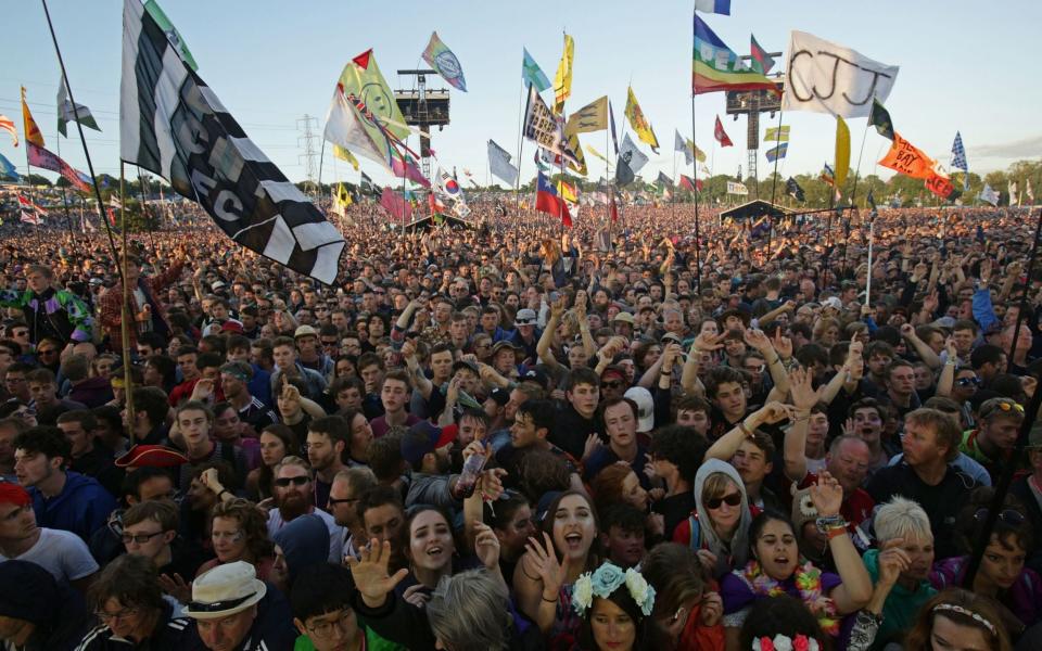 Crowds at the 2016 Glastonbury Festival - PA Wire