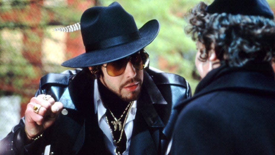 Adam Goldberg in a hat and sunglasses