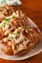 <p>Potatoes stuffed with bacon and cheese? Yes, please!</p><p>Get the recipe from <a href="https://www.delish.com/cooking/recipe-ideas/a23722114/bacon-stuffed-potatoes-recipe/" rel="nofollow noopener" target="_blank" data-ylk="slk:Delish;elm:context_link;itc:0;sec:content-canvas" class="link ">Delish</a>. </p>