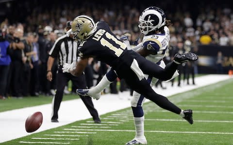New Orleans Saints wide receiver Tommylee Lewis (11) works for a coach against Los Angeles Rams defensive back Nickell Robey-Coleman (23) during the second half the NFL football NFC championship game Sunday, Jan. 20, 2019, in New Orleans. The Rams won 26-23 - Credit: AP
