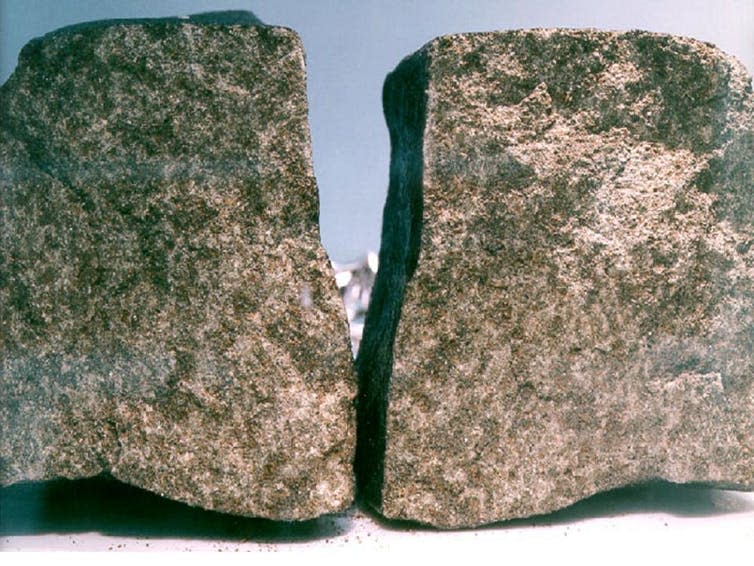 <span class="caption">Nakhla meteorite (BM1913,25) inside surfaces after breaking in 1998.</span> <span class="attribution"><span class="source">NASA</span></span>