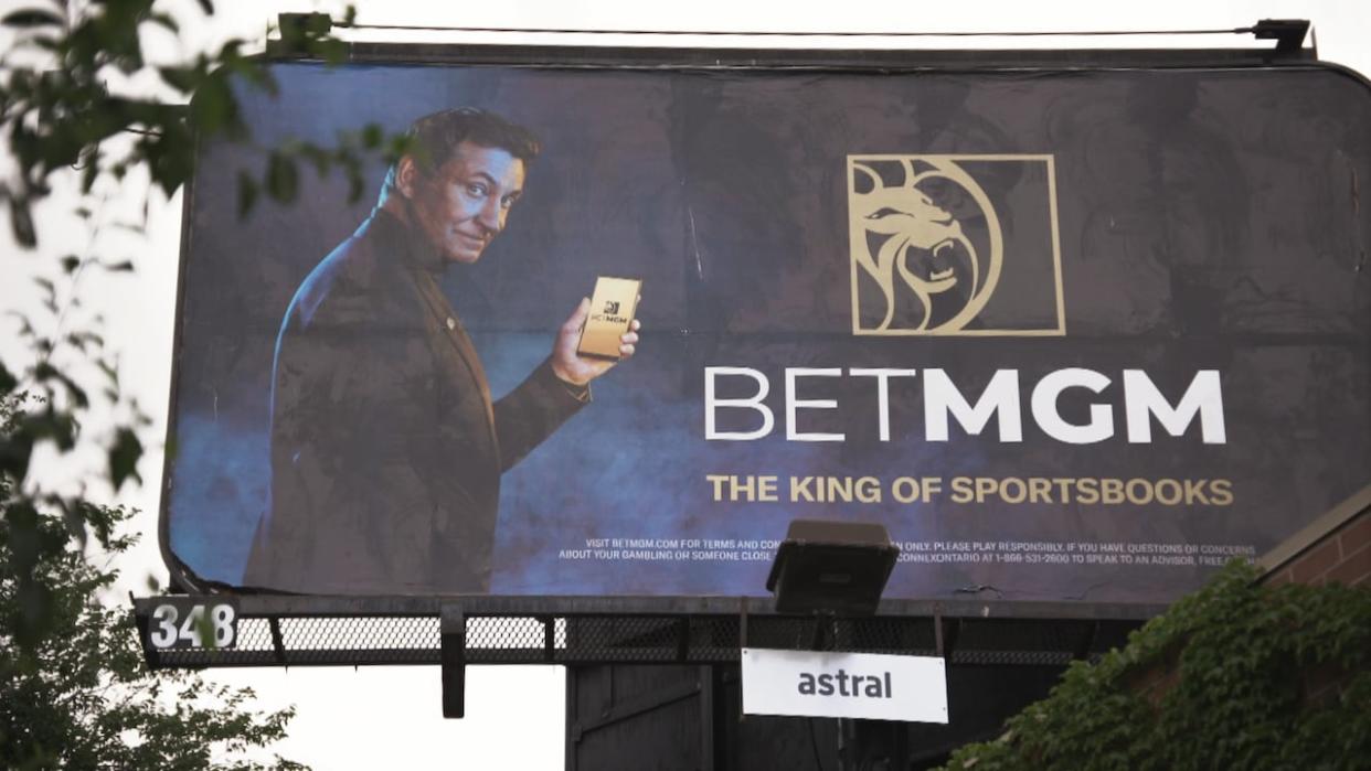 Hockey legend Wayne Gretzky is pictured in a sports betting advertisement. Athletes are now banned in the advertising and marketing of internet gaming in Ontario. (Andy Hincenbergs/CBC - image credit)