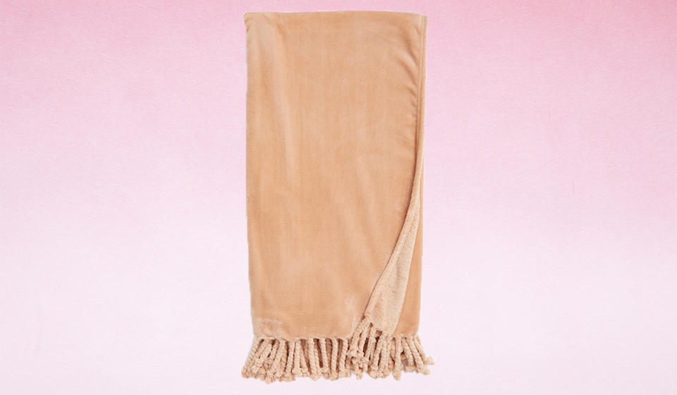 Curl up with this apricot-hued blanket. (Photo: Nordstrom)