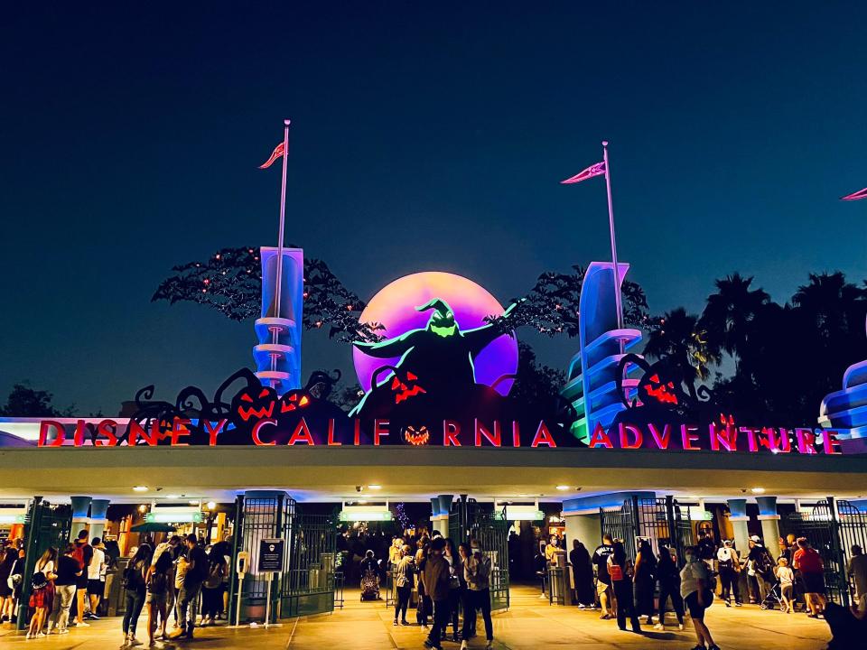 exterior shot of the entrance to disney california adventure decorated for oogie boogie bash