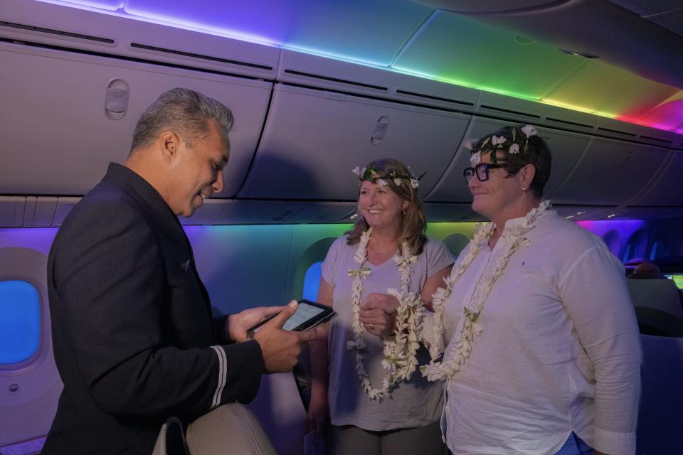 Air Tahiti Nui's Rodrigue Chan officiating Sandy Stier and Kris Perry's vow renewal on June 3, 2023.