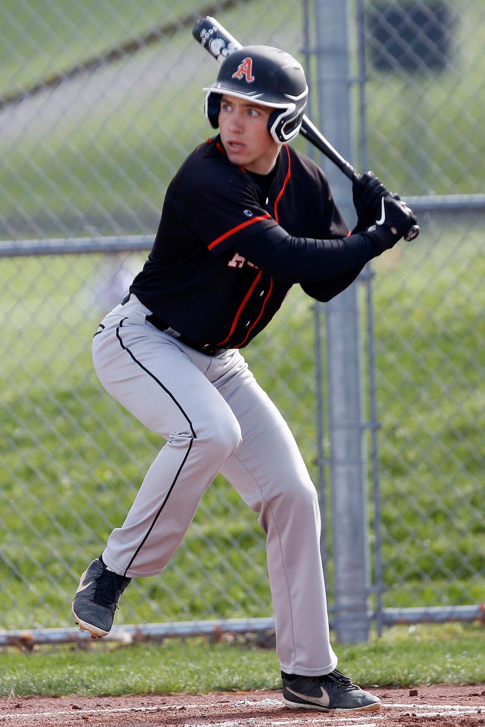 Ashland High School's Jon Metzger (9) bats against West Holmes High School during high school baseball action Tuesday, April 18, 2023 at West Holmes High School. TOM E. PUSKAR/ASHLAND TIMES-GAZETTE