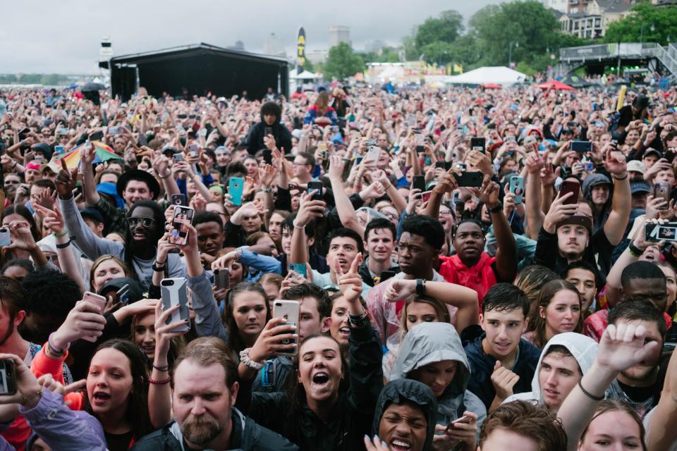 The crowd has high energy during a surprise appearance by Miley Cyrus at Beale Street Music Festival.