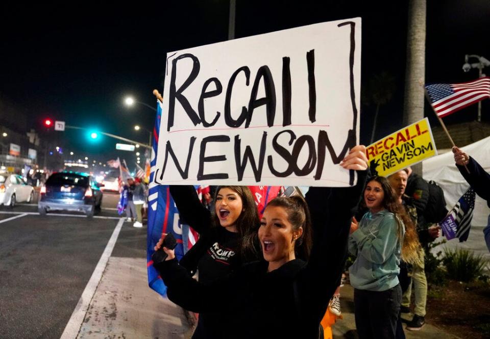 Protesters demand a recall on California Gov. Gavin Newsom as complaints against a pandemic stay-at-home order in Huntington Beach, Calif., in November.