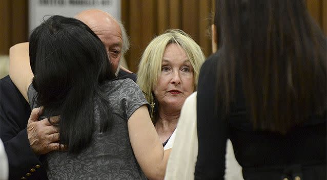 Parents of the late Reeva Steenkamp, Barry and June Steenkamp, facing left and right, arrive in court in Pretoria, South Africa. Photo: AP