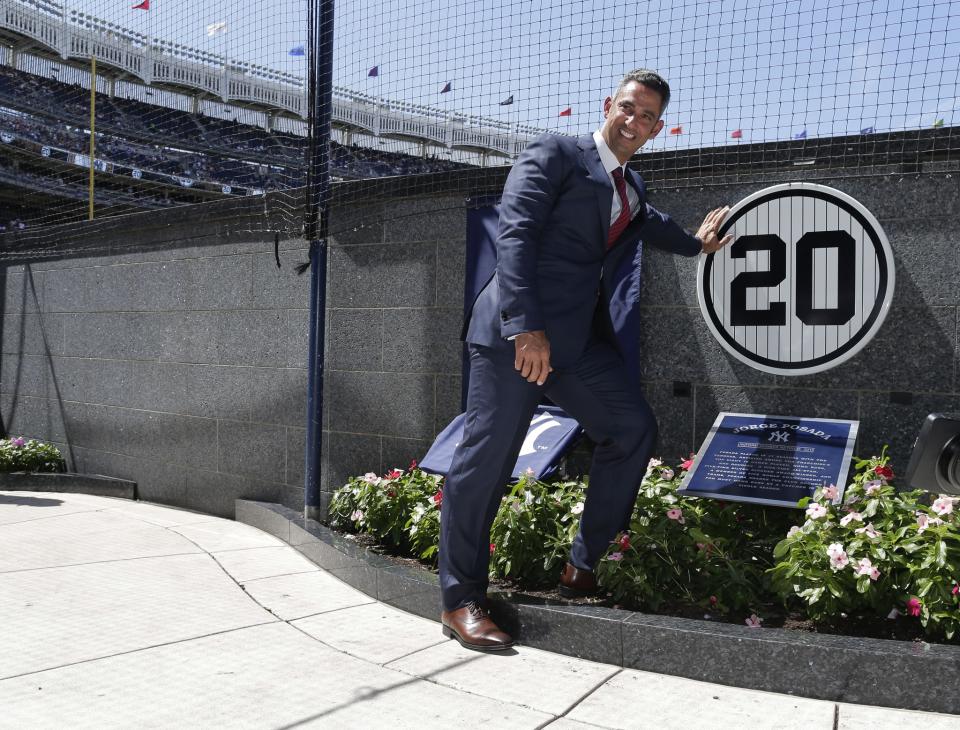 Jorge Posada has a spot in the Yankees' Monument Park and has his number retired. (AP) 
