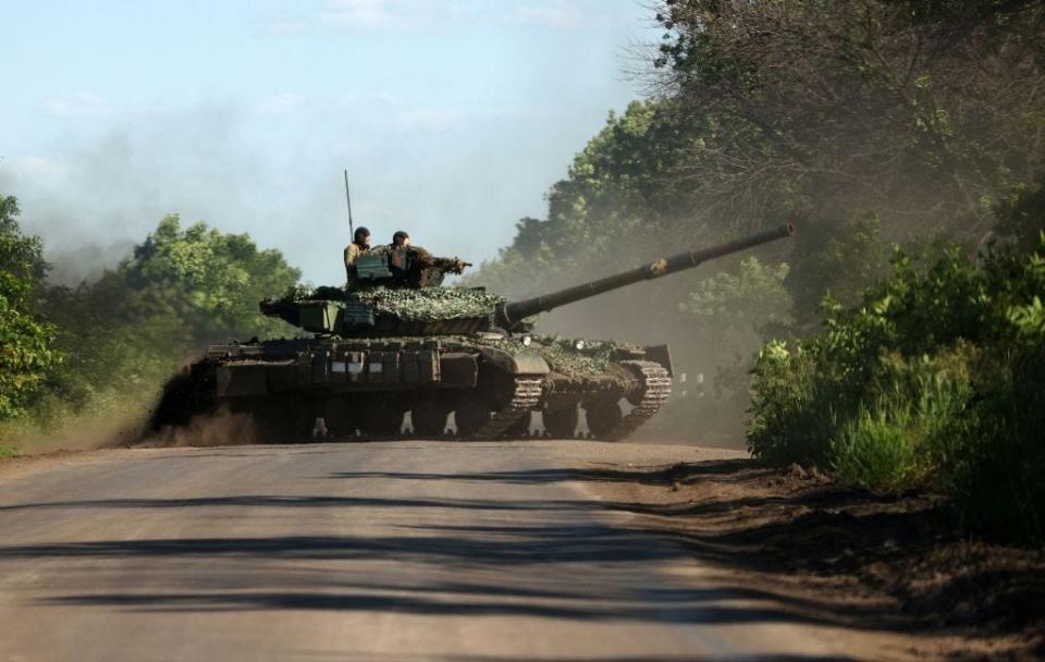 Ukrainian servicemen drive a tank on a road near the front line in the Donetsk region on June 5, 2023, amid the Russian invasion of Ukraine.