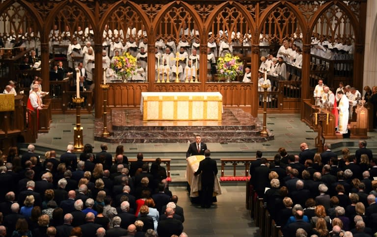 Barbara Bush's casket is carried into St Martin's Episcopal Church by pallbearers at her funeral in Houston, Texas