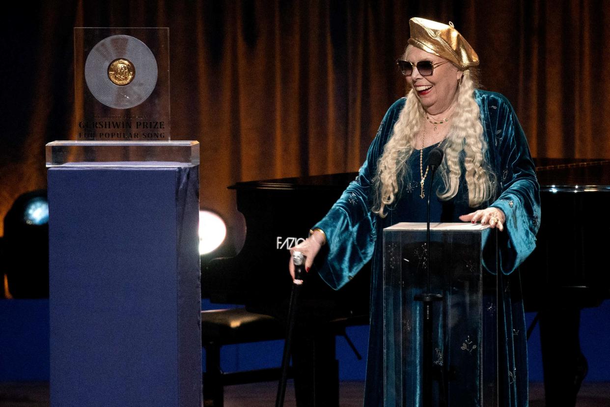 Honoree Canadian singer-songwriter Joni Mitchell performs onstage during the Library of Congress Gershwin Prize for Popular Song ceremony in Washington, DC, March 1, 2023.