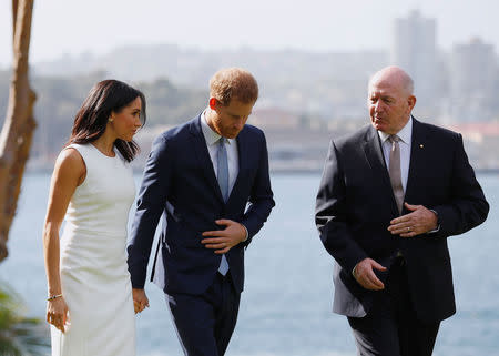 Britain's Prince Harry and wife Meghan, Duchess of Sussex walk with Australia's Governor General Peter Cosgrove at Admiralty House during their visit in Sydney, Australia October 16, 2018. REUTERS/Phil Noble/Pool