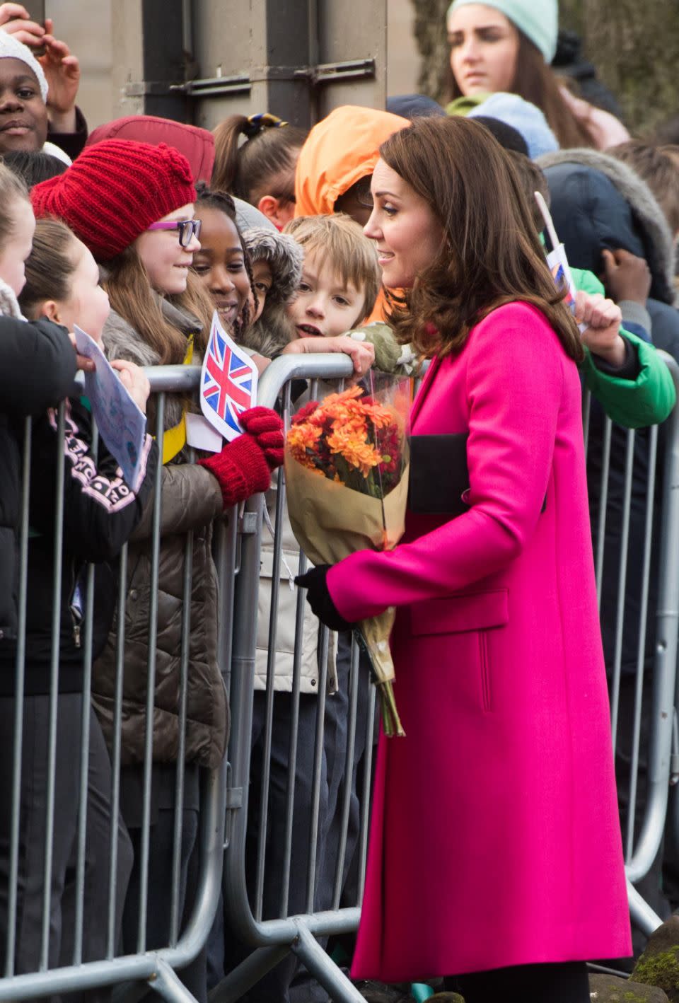 The boy had been waiting in the crowd for three hours to meet the royals. Photo: Getty Images