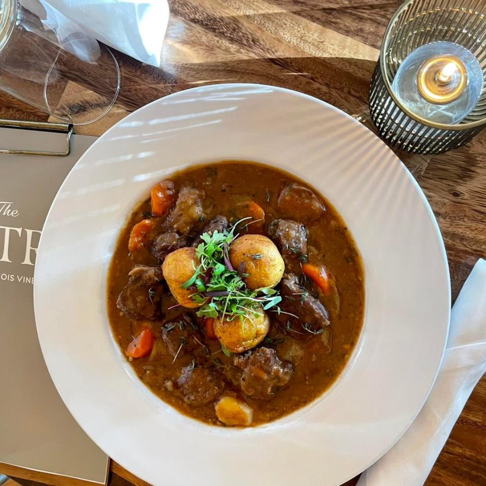 The Bistro's beef stew with corn fritters ($22)