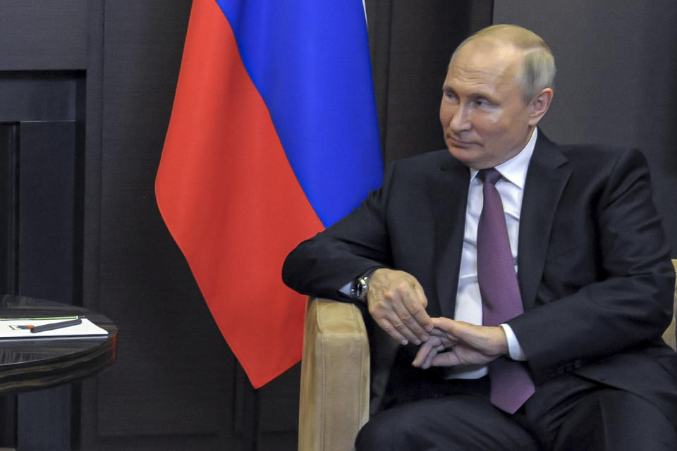 Russian President Vladimir Putin listens to Belarusian President Alexander Lukashenko during their meeting in the Black Sea resort of Sochi, Russia, Friday, May 28, 2021. (Mikhail Klimentyev, Sputnik, Kremlin Pool Photo via AP)