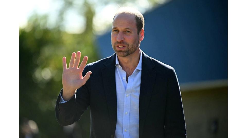 Britain's Prince William, Prince of Wales, waves upon his arrival to visit Birtley Community Pool 