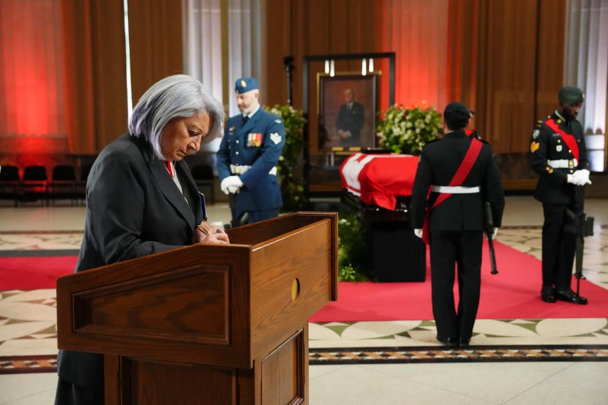 Governor General Mary Simon pays her respects as former prime minister Brian Mulroney lies in state in the Sir John A. Macdonald building opposite Parliament Hill in Ottawa on Tuesday, March 19, 2024.  (Sean Kilpatrick/Canadian Press - image credit)