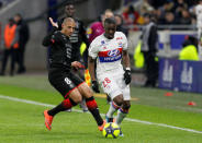 Soccer Football - Ligue 1 - Olympique Lyonnais vs Rennes - Groupama Stadium, Lyon, France - February 11, 2018 Stade Rennes’ Wahbi Khazri in action with Lyon's Tanguy Ndombele REUTERS/Emmanuel Foudrot