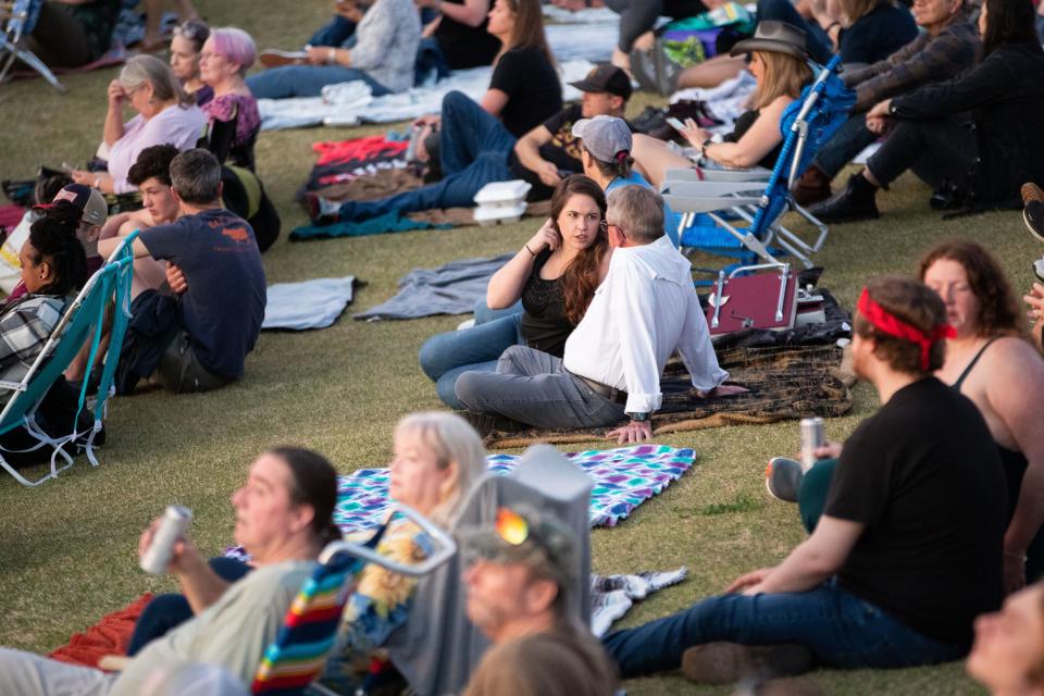 Fans fill the lawn at Adderley Amphitheater as they eagerly wait for Willie Nelson to perform Saturday, March 4, 2023.